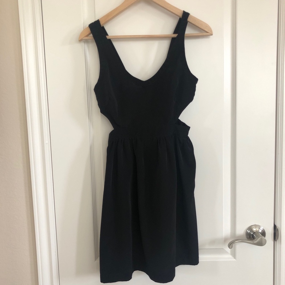 Black dress with cut sides